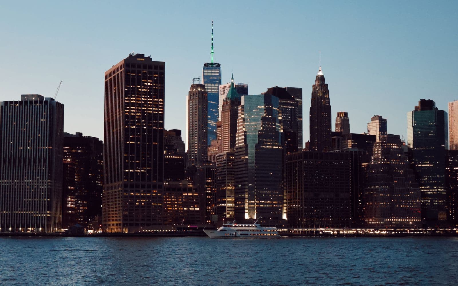 Manhattan skyline at sunset with One World Trade Center