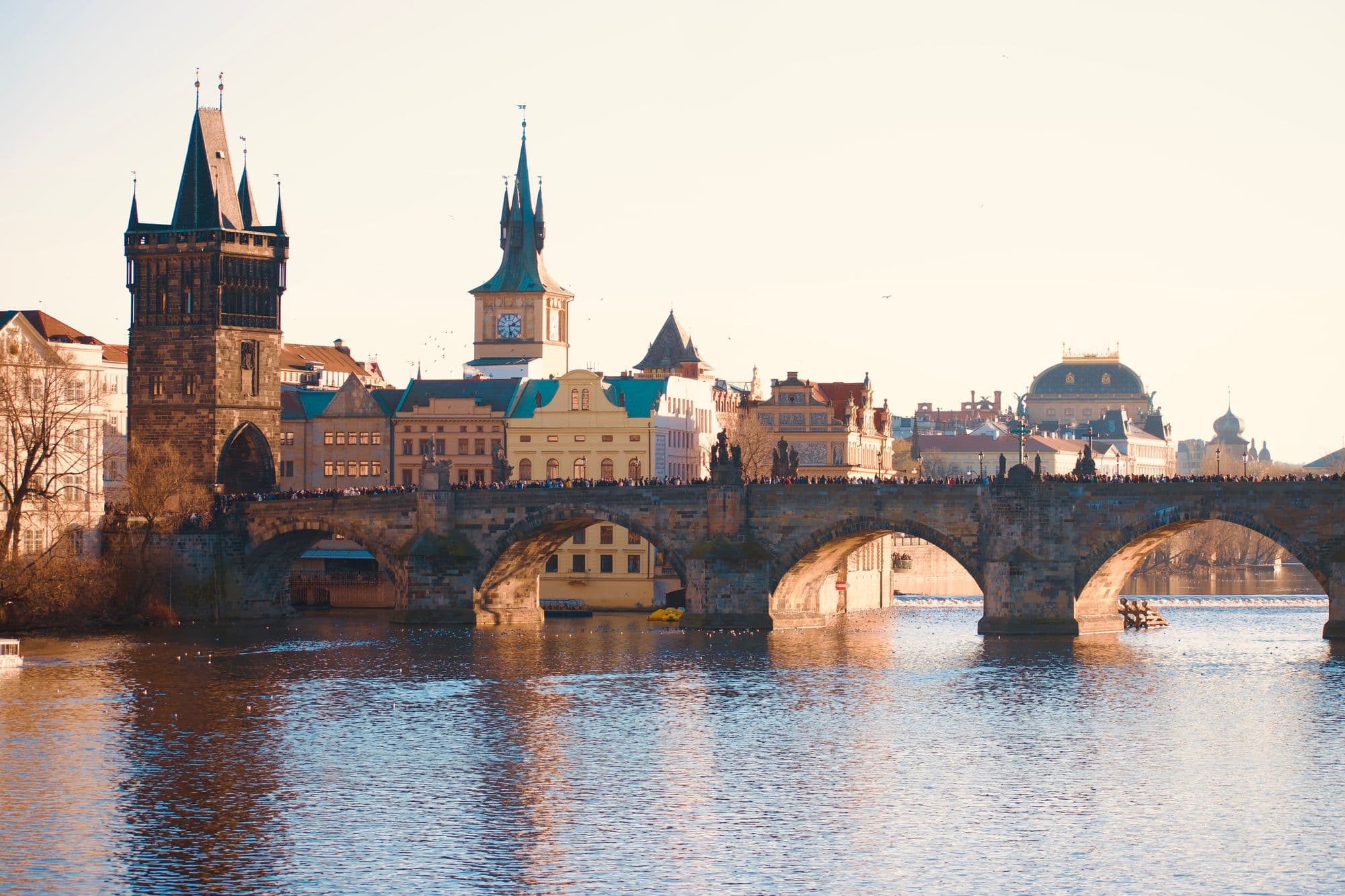 Charles Bridge and the Old Town Bridge Tower over the Vltava river in Prague, Czech Republic